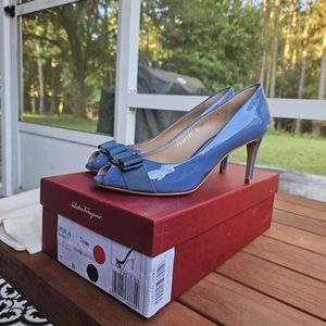 Salvatore Ferragamo peek toe pump. Blue patent leather size 7